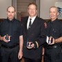 Médailles pour Services distingués à trois pompiers