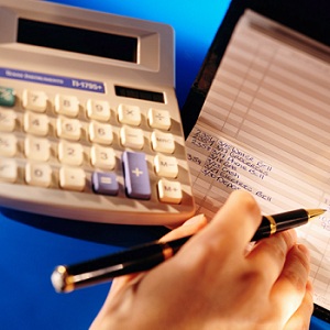 taxe calculatrice cheque paiement Photo CPA publiee par INFOSuroit.com_
